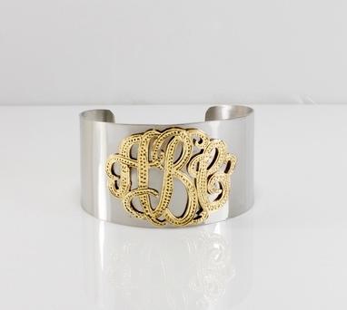 Wide stainless steel cuff with raised beaded monogram  Apparel & Accessories > Jewelry > Bracelets